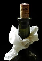 Image showing bottle of wine with napkin