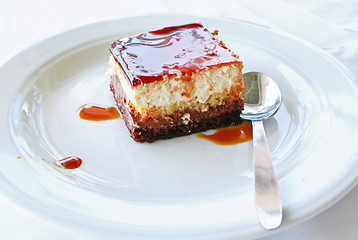 Image showing Dessert - Cheesecake with strawberry sauce 