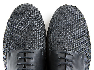 Image showing stylish pair of black leather shoes