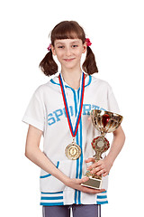 Image showing Girl with a medal and a gold cup