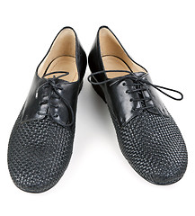 Image showing stylish pair of black leather shoes