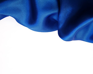 Image showing Smooth elegant dark blue silk on white background 