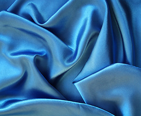 Image showing Smooth elegant blue silk as background 