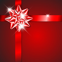 Image showing Red bow on a red ribbon with red  background