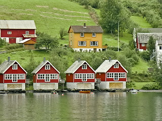 Image showing red houses on Fjord river