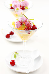 Image showing Pineapple punch with cherry ice cream