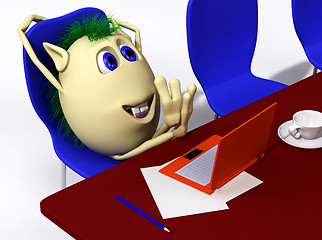 Image showing Puppet resting behind orange laptop on chair