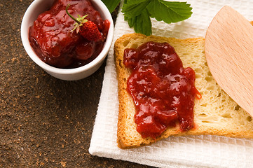 Image showing Wild strawberry jam with toast