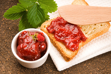 Image showing Wild strawberry jam with toast