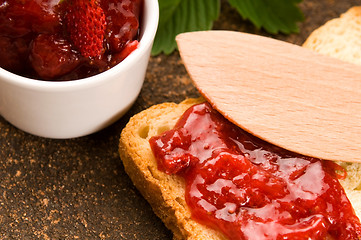 Image showing Wild strawberry jam with toast