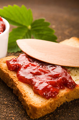 Image showing Wild strawberry jam with toast