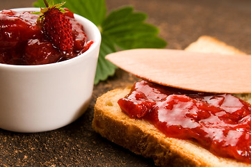 Image showing Wild strawberry jam with toast