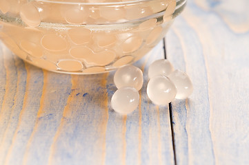 Image showing tapioca pearls with lime. white bubble tea ingredients