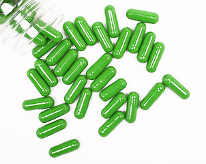 Image showing Green pills on white background