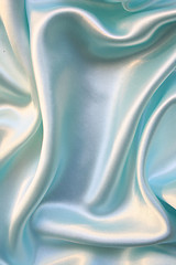 Image showing Smooth elegant blue silk as background