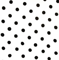 Image showing White fabric with black peas can use as background