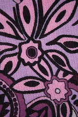 Image showing Pattern with lilac flowers on a fabric as background 