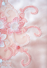 Image showing Flower lace on the elegant pink silk