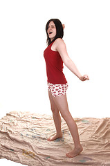 Image showing Girl standing stretching.