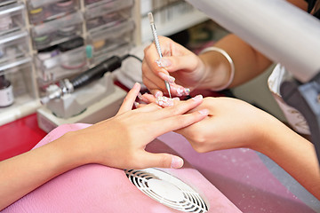 Image showing manicure process on female hand