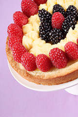 Image showing Custard tart with raspberries and blackberries