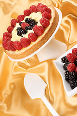 Image showing Custard tart with raspberries and blackberries