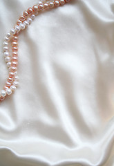 Image showing Smooth elegant white silk with pearls as background 