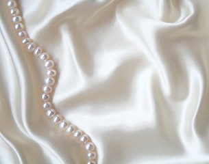 Image showing Smooth elegant white silk with pearls as wedding background