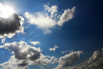 Image showing clouds and sun on blue sky