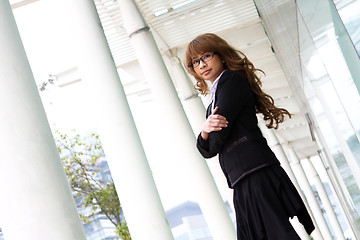 Image showing pretty asian business woman at office building 