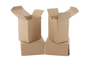 Image showing Brown cardboard boxes arranged in stack