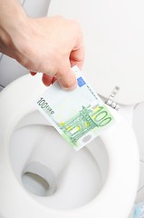 Image showing money and toilet