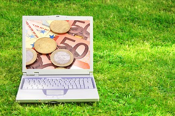 Image showing laptop and money