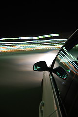 Image showing night drive with car in motion 