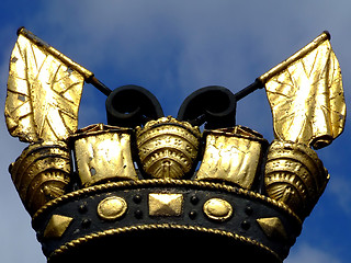 Image showing Black and gold crown