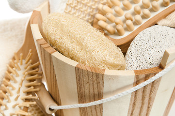 Image showing Wooden bucket with SPA accessories