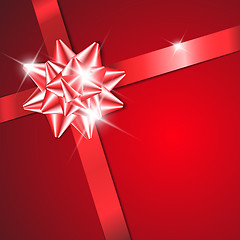 Image showing Red bow on a red ribbon with red background 