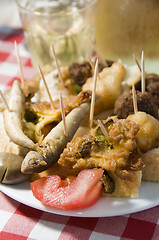 Image showing plate of mezes appetizers wine Greek food