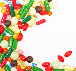 Image showing Colorful pills on white background 