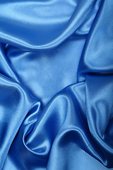 Image showing Smooth elegant blue silk as background 