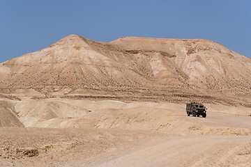 Image showing Israeli army Humvee on patrol in the Judean desert 