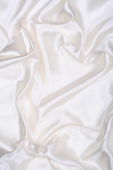 Image showing Smooth elegant white silk as background 