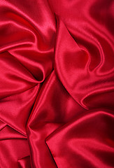 Image showing Smooth elegant red silk as background 