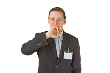 Image showing Tired young businessman yawning