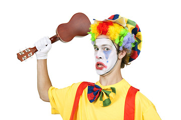 Image showing Colorful clown with ukulele