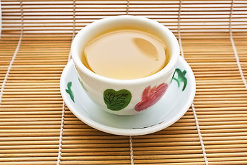 Image showing Tea on bamboo mat