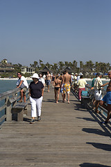 Image showing tourists walking along naples pier