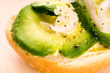 Image showing Sandwich with avocado on a wooden board 