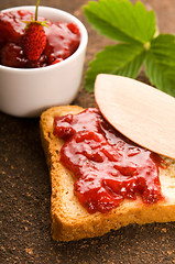 Image showing Wild strawberry jam with toast