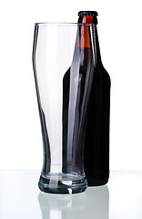 Image showing Bottle of dark beer and glass, isolated